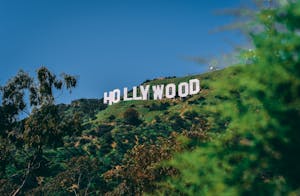 A scenic view of the famous Hollywood sign on a sunny day in Los Angeles.