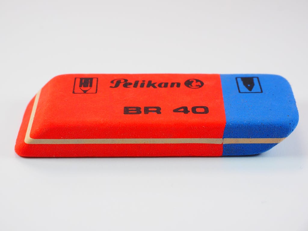Close-up of a red and blue Pelikan BR 40 eraser, perfect for office supplies.